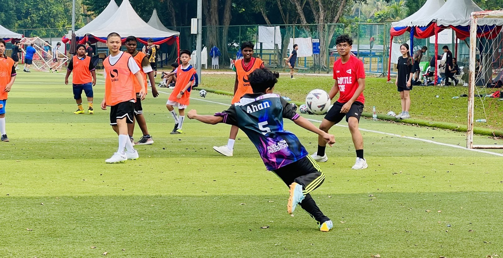 A player striking the ball during match play