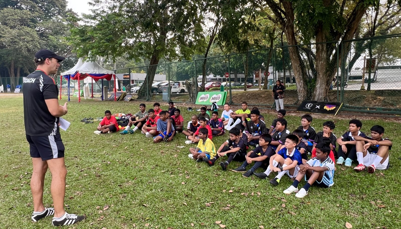 Coach addressing the squad during a training session